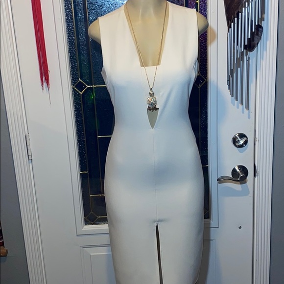 ⭐️⭐️SEXY WHITE MIDI CUT OUT DRESS⭐️⭐️ - Picture 2 of 4